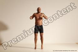 Underwear Gymnastic poses Man Black Muscular Bald Dancing Dynamic poses Academic